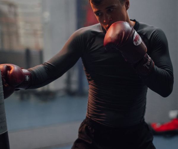 A man looking determined and strong after a successful workout session.